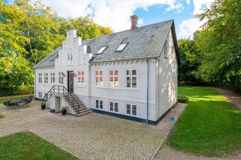 Casa de Hans Christian Andersen, o Kragsbjerggaardem Dinamarca - casa branca